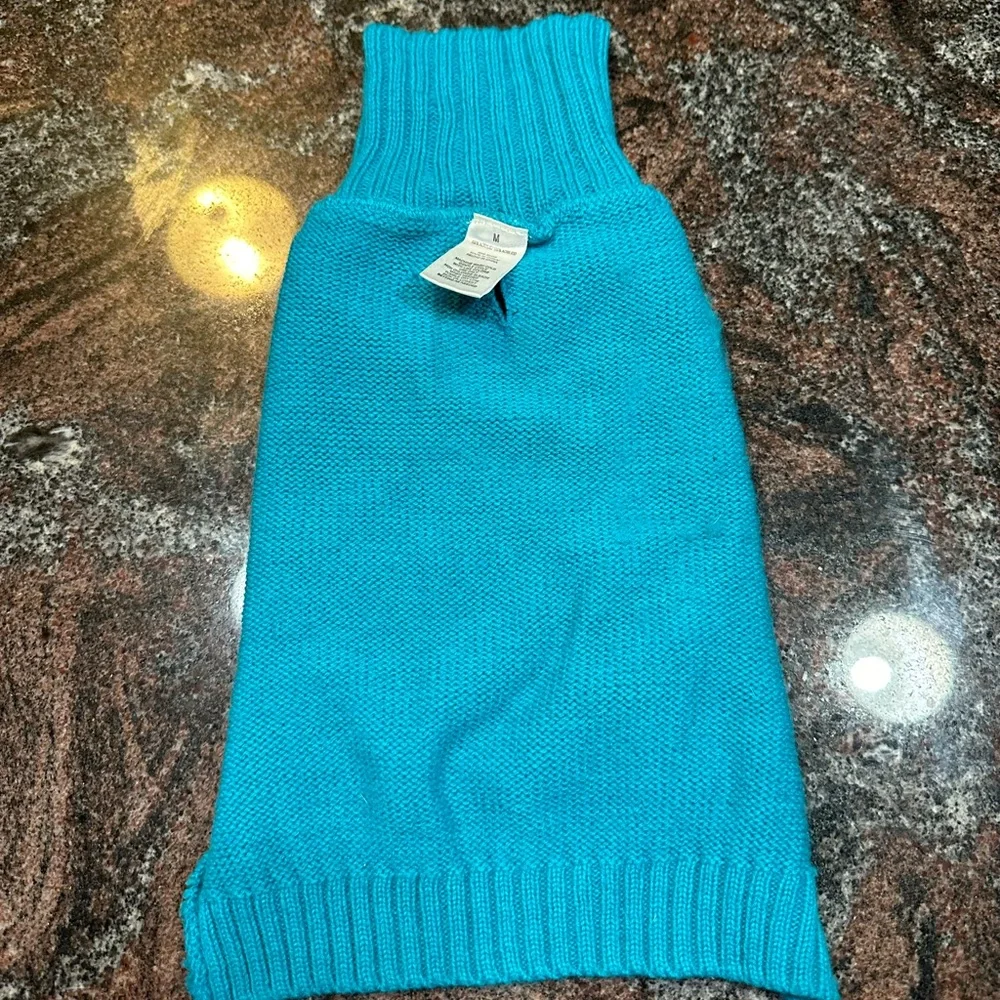Teal colored dog sweater size M
